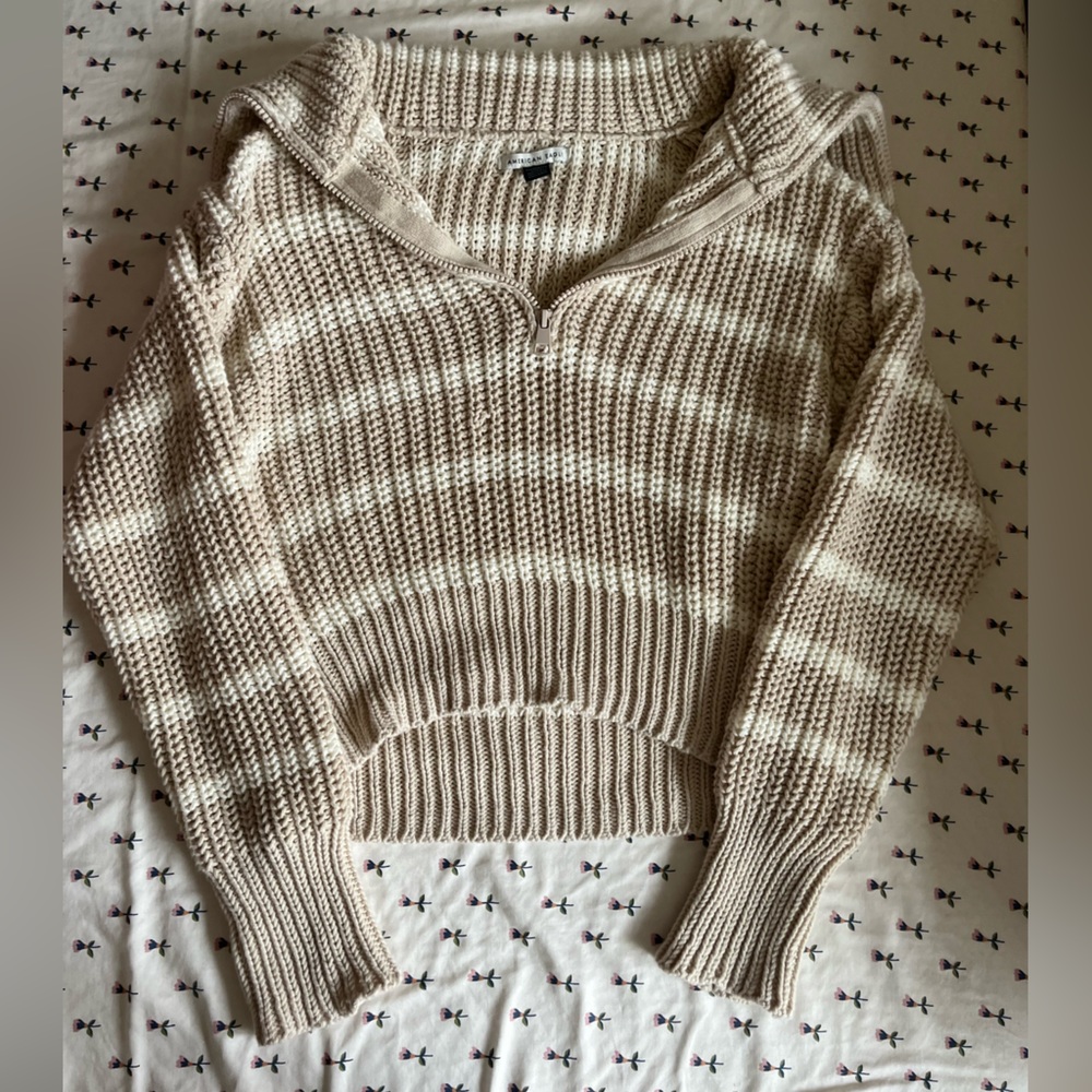 Beige off the shoulder kind of zip up sweater